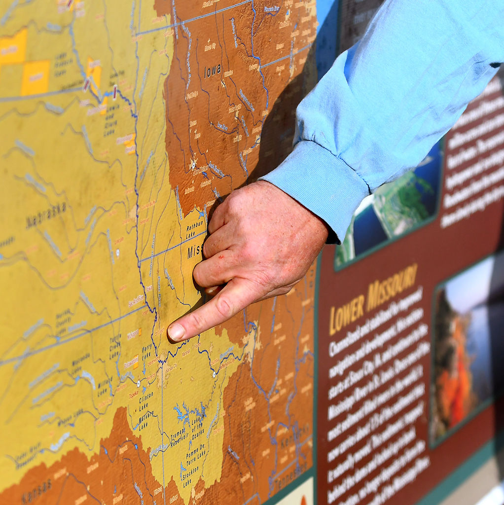 Steve Schnarr points on the map to show the practical program